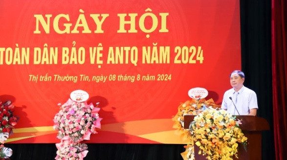 Đồng chí Nguyễn Xuân Minh - Phó Bí thư Huyện ủy, Chủ tịch UBND huyện phát biểu tại ngày hội.