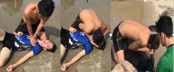 Hình ảnh đồng chí Ngô Thái Hiếu sơ cứu các nạn nhân được người dân ghi lại