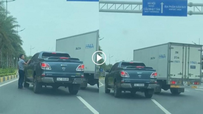 Hình ảnh hai lái xe chèn ép nhau trên đường