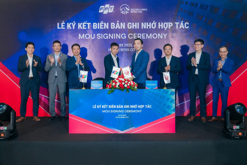 Đại diện AIA và FPT tại buổi lễ ký kết biên bản ghi nhớ hợp tác Đại diện AIA và FPT tại buổi lễ ký kết biên bản ghi nhớ hợp tác