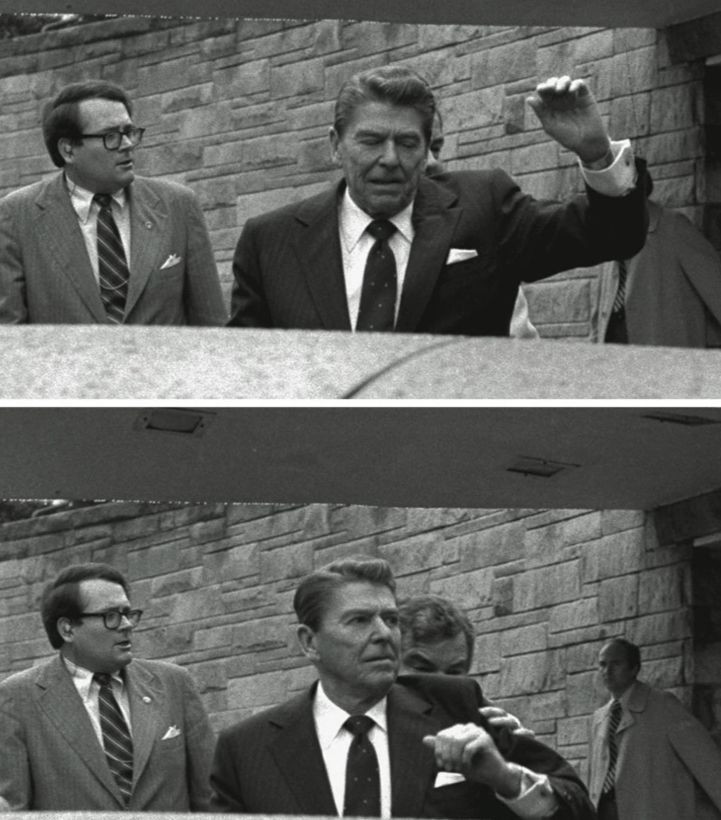 Tổng thống Gerald Ford được mật vụ nhanh chóng hộ tống sau khi có người nổ súng nhằm vào ông trước khách sạn Francis ở San Francisco hôm 22-9-1975