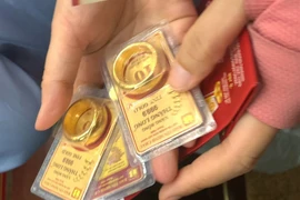 Nhận thưởng Tết bằng vàng, sổ tiết kiệm, ti vi, tủ lạnh có phải đóng thuế thu nhập cá nhân?