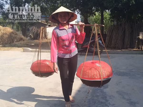 Gánh mâm góp cỗ và mừng tuổi dịp đầu xuân năm mới ảnh 1