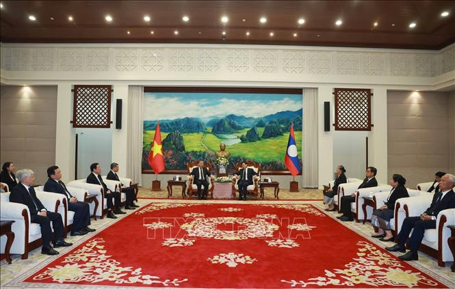 Tổng Bí thư Tô Lâm gặp Tổng Bí thư, Chủ tịch nước Lào Thongloun Sisoulith . Ảnh: Thống Nhất/TTXVN
