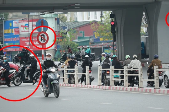 Nhiều phương tiện vừa vượt đèn đỏ, vừa phớt lờ biển cấm ở Cầu Giấy
