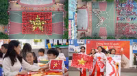 Học sinh Hà Nội xếp hình cờ Tổ quốc, bản đồ Việt Nam chào mừng 50 năm Ngày Giải phóng miền Nam