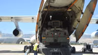 the-s-400-air-defense-system-is-unloaded-from-a-russian-tr-7261.jpg