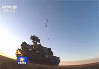 pgz07-35mm-cannon-and-hq17-surface-to-air-defense-missile-systems-in-service-with-chinese-army-640-001-1502683044978.jpg