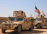 [ẢNH] Đoàn xe quân đội Mỹ bị tấn công tại Syria