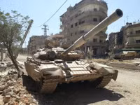 [ẢNH] Phiến quân đánh rát, lính Syria bỏ cả chiến tăng T-72 để tháo chạy