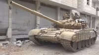 [ẢNH] Phiến quân đánh rát, lính Syria bỏ cả chiến tăng T-72 để tháo chạy