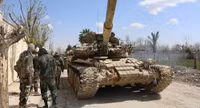 [ẢNH] Phiến quân đánh rát, lính Syria bỏ cả chiến tăng T-72 để tháo chạy