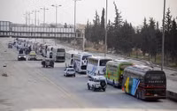 Hàng nghìn phiến quân và dân thường rời khỏi Đông Ghouta
