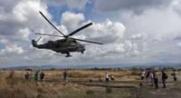 [ẢNH] Trực thăng vũ trang Syria bất ngờ tấn công dữ dội phiến quân tại Lattakia
