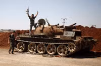 [ẢNH] IS chớp thời cơ tấn công lớn ở miền Trung khi quân đội Syria dồn lực lượng về Tây Bắc