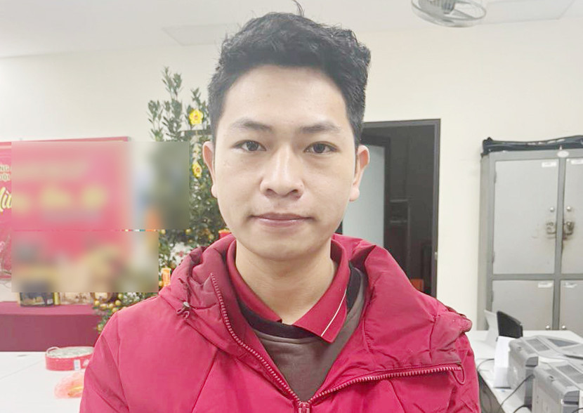 Trần Văn Tam tại cơ quan công an