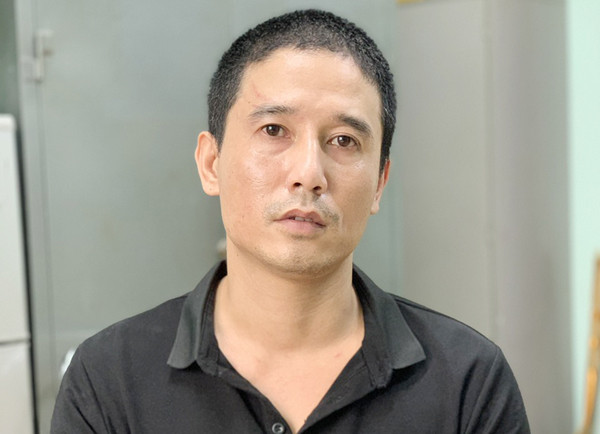 Đối tượng Nguyễn Tiến Phi tại cơ quan công an Đối tượng Nguyễn Tiến Phi tại cơ quan công an