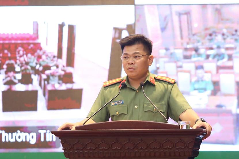 Thượng tá Phạm Đăng Khôi, Chánh Thanh tra CATP tham luận tại hội nghị