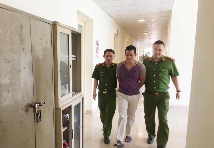 Cơ quan CSĐT - CAQ Nam Từ Liêm thực hiện dẫn giải đối tượng Đỗ Văn Đồng