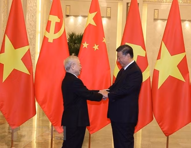 Tổng Bí thư, Chủ tịch Trung Quốc Tập Cận Bình đón Tổng Bí thư Nguyễn Phú Trọng (Ảnh: Trí Dũng/TTXVN)