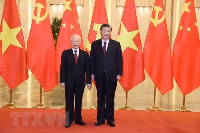 Tổng Bí thư Nguyễn Phú Trọng và Tổng Bí thư, Chủ tịch Trung Quốc Tập Cận Bình chụp ảnh chung (Ảnh: Trí Dũng/TTXVN)