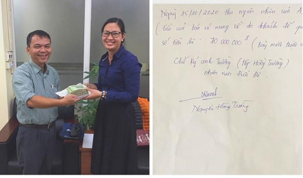 Chị Lan Nam vui mừng nhận lại số tiền 70 triệu đồng đã bỏ quên trên xe buýt