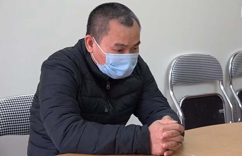 Đối tượng Phạm Văn Hơn tại cơ quan điều tra. Ảnh: VOV