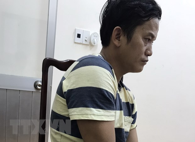 Tài xế Nguyễn Đắc An tại cơ quan công an. Ảnh: TTXVN