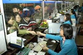 Vé tàu tết điện tử:Hành khách phải đến ga lấy vé trước 4 tiếng