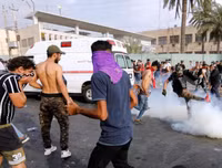 [ẢNH] Iraq tan hoang vì biểu tình biến thành bao động