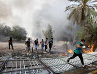 [ẢNH] Iraq tan hoang vì biểu tình biến thành bao động