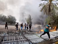 [ẢNH] Iraq tan hoang vì biểu tình biến thành bao động