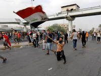 [ẢNH] Iraq tan hoang vì biểu tình biến thành bao động