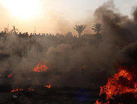 [ẢNH] Iraq tan hoang vì biểu tình biến thành bao động