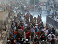 [ẢNH] Iraq tan hoang vì biểu tình biến thành bao động