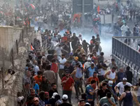 [ẢNH] Iraq tan hoang vì biểu tình biến thành bao động