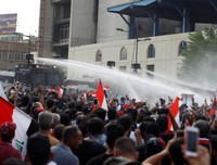 [ẢNH] Iraq tan hoang vì biểu tình biến thành bao động