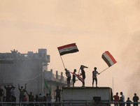 [ẢNH] Iraq tan hoang vì biểu tình biến thành bao động