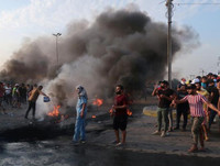 [ẢNH] Iraq tan hoang vì biểu tình biến thành bao động