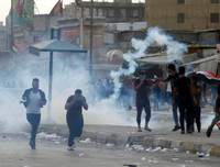 [ẢNH] Iraq tan hoang vì biểu tình biến thành bao động