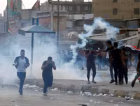[ẢNH] Iraq tan hoang vì biểu tình biến thành bao động