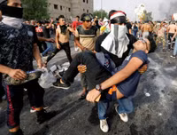 [ẢNH] Iraq tan hoang vì biểu tình biến thành bao động