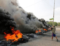 [ẢNH] Iraq tan hoang vì biểu tình biến thành bao động