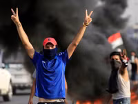 [ẢNH] Iraq tan hoang vì biểu tình biến thành bao động