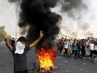 [ẢNH] Iraq tan hoang vì biểu tình biến thành bao động