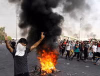 [ẢNH] Iraq tan hoang vì biểu tình biến thành bao động