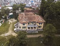 [ẢNH] Cận cảnh khu trung tâm Hòa Bình sắp bị phá bỏ của Đà Lạt xưa và nay