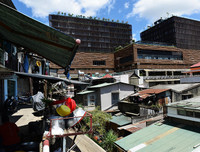 [ẢNH] Cận cảnh khu trung tâm Hòa Bình sắp bị phá bỏ của Đà Lạt xưa và nay