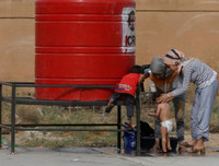 [ẢNH]: Đau lòng cuộc sống bấp bênh của các em nhỏ trong cuộc chiến ở đông bắc Syria