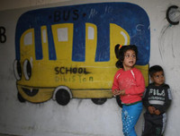 [ẢNH]: Đau lòng cuộc sống bấp bênh của các em nhỏ trong cuộc chiến ở đông bắc Syria